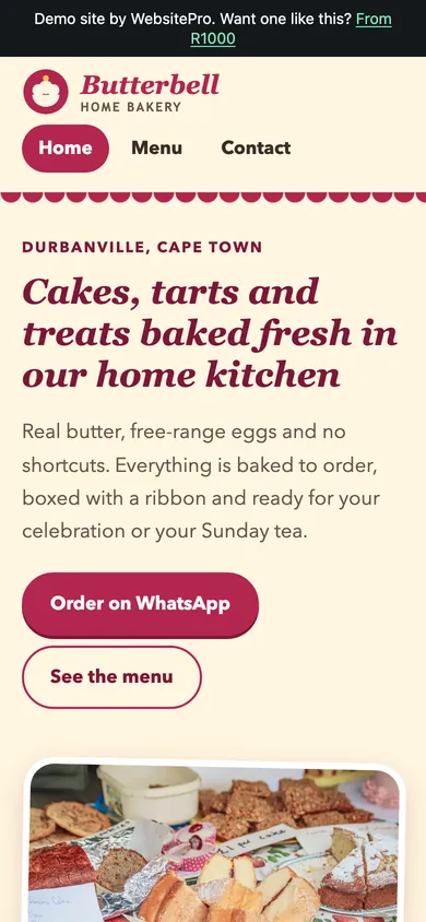 Phone screenshot of the Butterbell Home Bakery example website, with a warm headline about fresh home baking and an Order on WhatsApp button