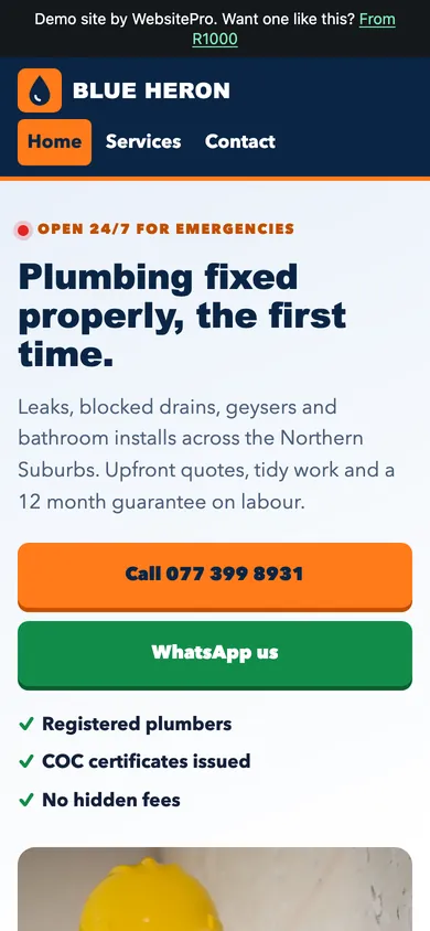 Phone screenshot of the Blue Heron Plumbing example website, showing an orange Call button and a green WhatsApp button under the headline
